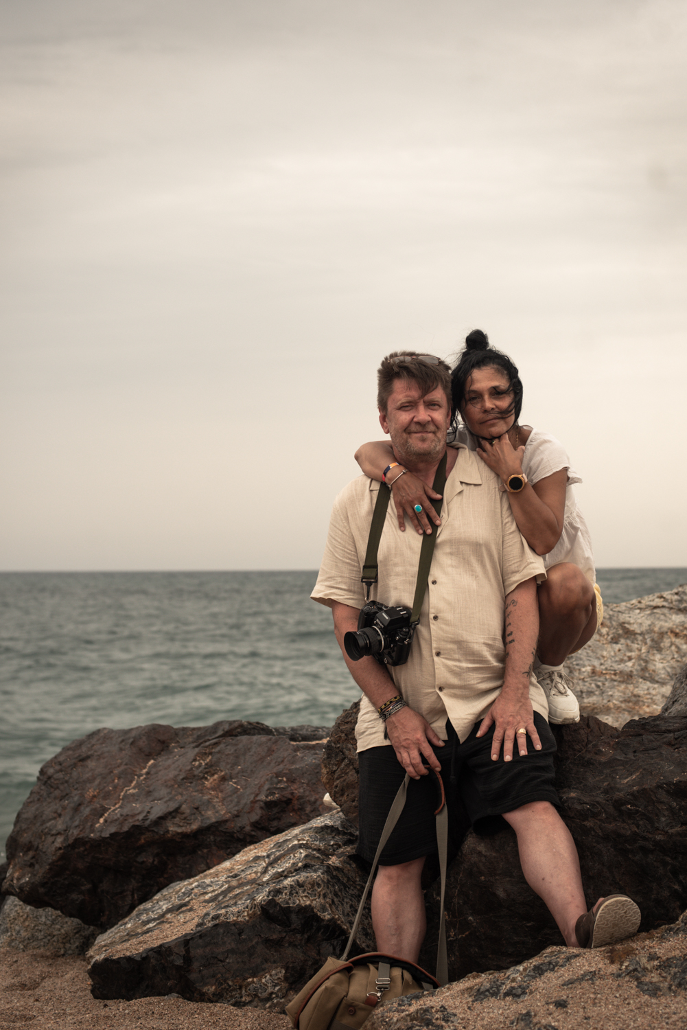 Author and partner by the sea